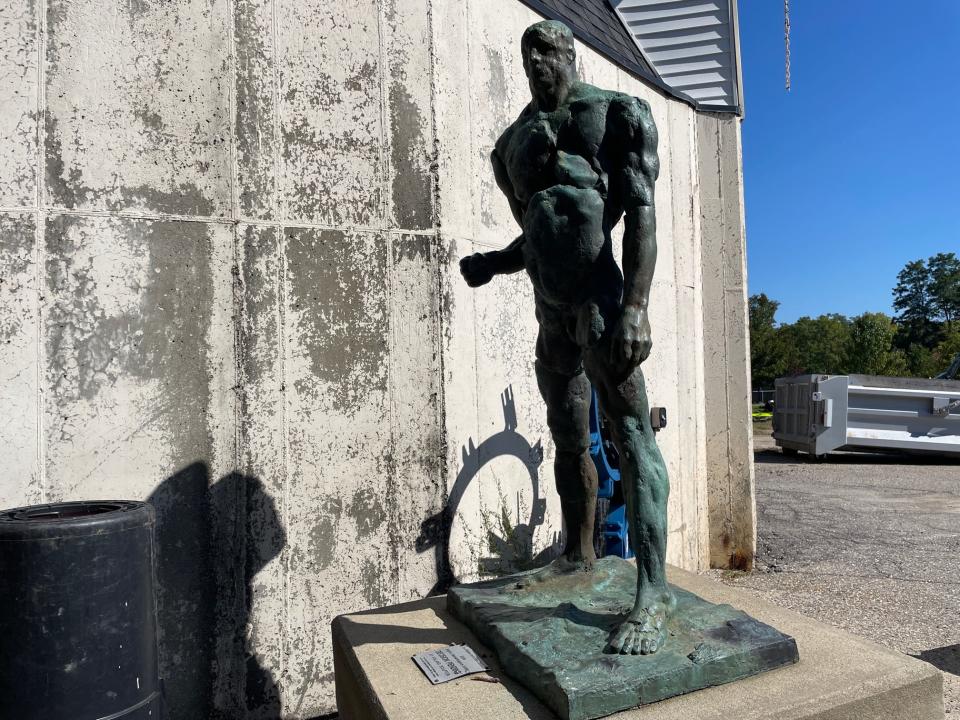 "Decision Pending," a public art sculpture created by Detroit artist and veteran Jay Holland, was temporarily removed during streetscaping and stored at Brighton's Department of Public Services.