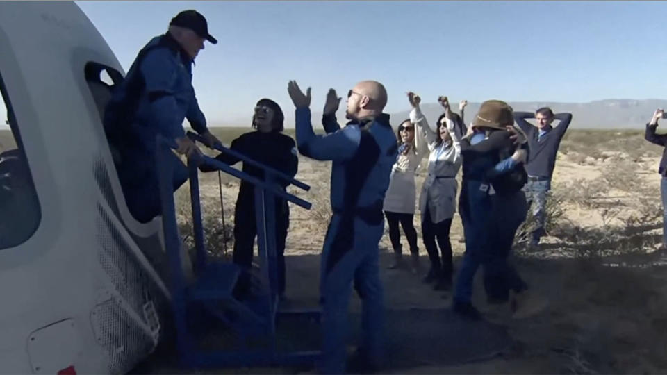 William Shatner steps out of the Blue Origin capsule after its spaceflight in Van Horn, Texas, Wednesday. (Blue Origin via Reuters Video)