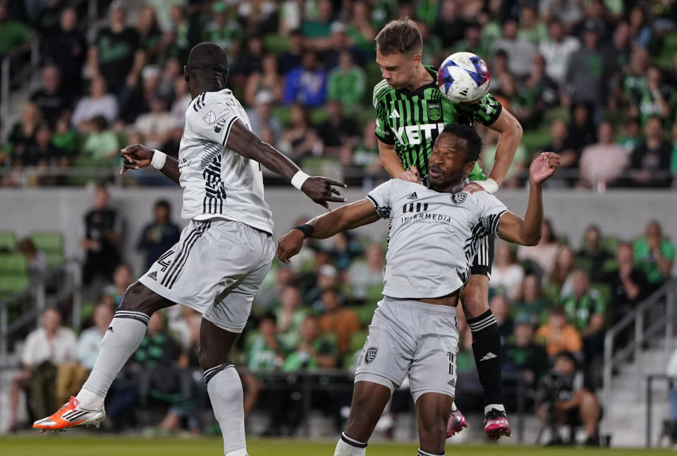 Austin FC defender Leo Vaisanen, top right, head the ball past San Jose Earthquakes forward Jeremy Ebobisse, bottom right, during the second half of an MLS soccer match in Austin, Texas, Saturday, April 29, 2023. (AP Photo/Eric Gay)