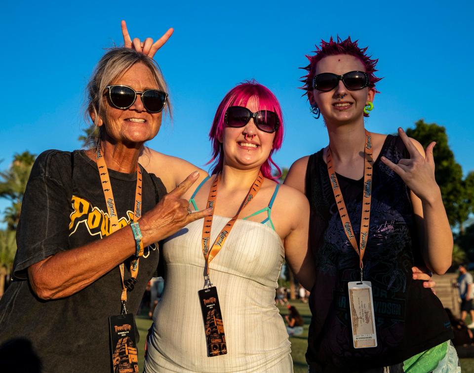 Kerri Yingst of Hobe Sound, Florida, poses for a photo with her 17-year-old grandkids Brooklyn Harper and Illy Pirylis of Cherry Hill, New Jersey, during the Power Trip music festival at the Empire Polo Club in Indio, Calif., Saturday, Oct. 7, 2023.