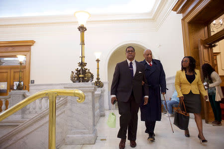 Actor and comedian, Bill Cosby walks through the Montgomery County Courthouse as the jury deliberates for the second day on his sexual assault retrial case at the Montgomery County Courthouse in Norristown, Pennsylvania, U.S., April 26, 2018. Mark Makela/Pool via Reuters