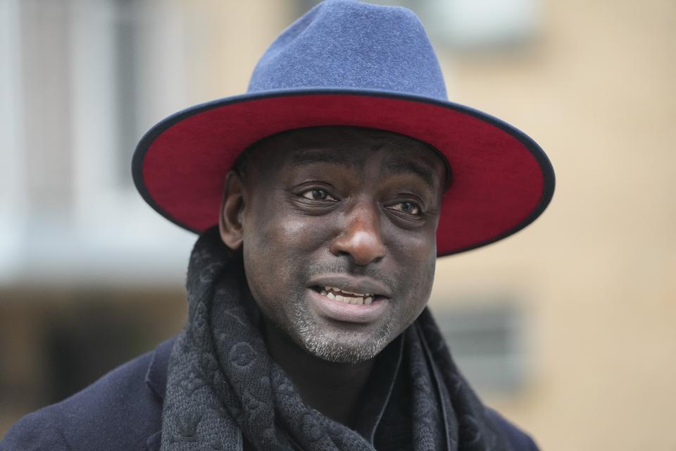 FILE - Yusef Salaam, one of the falsely imprisoned teenagers in the 1989 Central Park jogger case, speaks during a news interview while getting petition signatures for his campaign for New York City Council's 9th District, March 1, 2023, in New York. Some consider Salaam a folk hero as member of the “Central Park Five,” the group of teenagers wrongly convicted of raping a white jogger 34 years ago. Now he is banking on his painful past to help win a seat on the New York City Council. (AP Photo/Frank Franklin II, File)