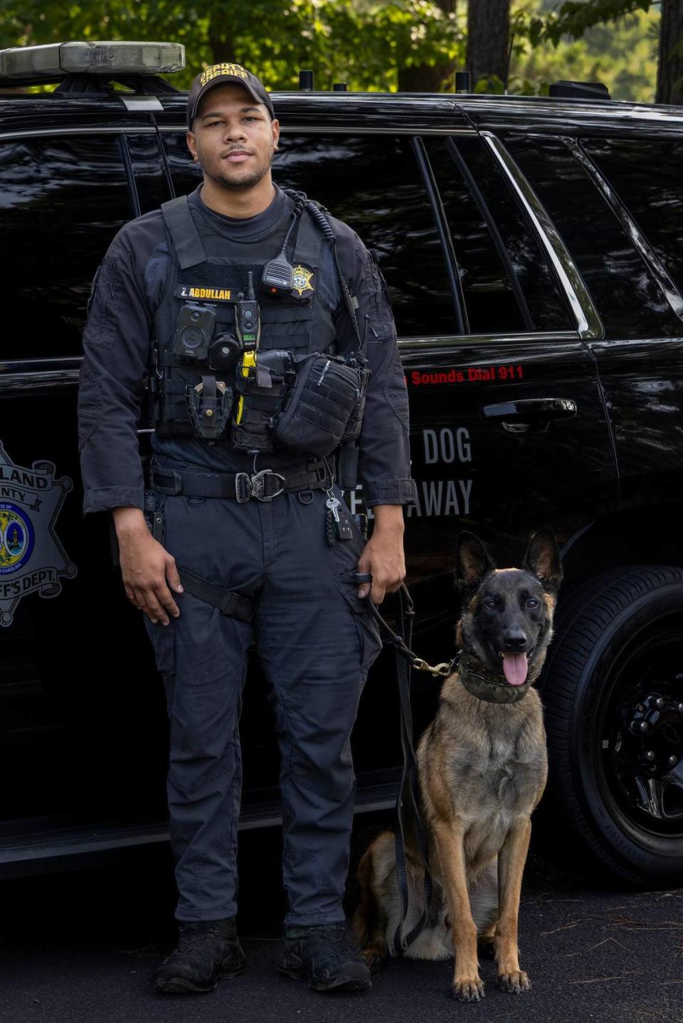 K9 Specialist Zaid Abdullah and K9 Wick.