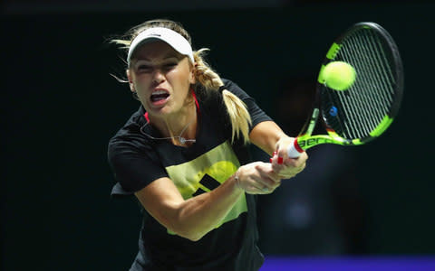 Caroline Wozniacki of Denmark practices prior to the BNP Paribas WTA Finals Singapore presented by SC Global at Singapore Sports Hub on October 21, 2017 in Singapore - Credit:  Getty Images