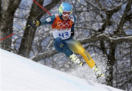 Australia's Dominic Demschar skis during the first run of the men's alpine skiing giant slalom event at the 2014 Sochi Winter Olympics at the Rosa Khutor Alpine Center February 19, 2014. REUTERS/Stefano Rellandini