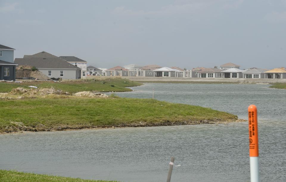 New housing is seen in varying stages of construction on Monday, March 13, 2023, in the west area north of Tradition in Port St. Lucie.