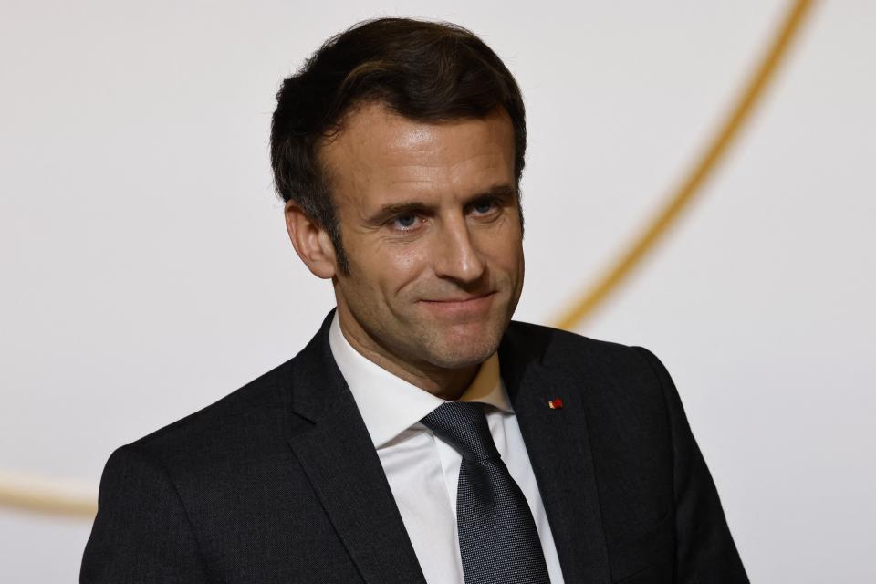 France's  President Emmanuel Macron is seen during a meeting with representatives of families of 1962 repatriates from Algeria at the Elysee palace in Paris, on January 26, 2022. - The trauma of the Algerian War has poisoned French politics for the past 60 years. Macron, France's first leader born after the colonial era, has made a priority of reckoning with its past and forging a new relationship with former colonies. (Photo by Ludovic MARIN / POOL / AFP) (Photo by LUDOVIC MARIN/POOL/AFP via Getty Images)