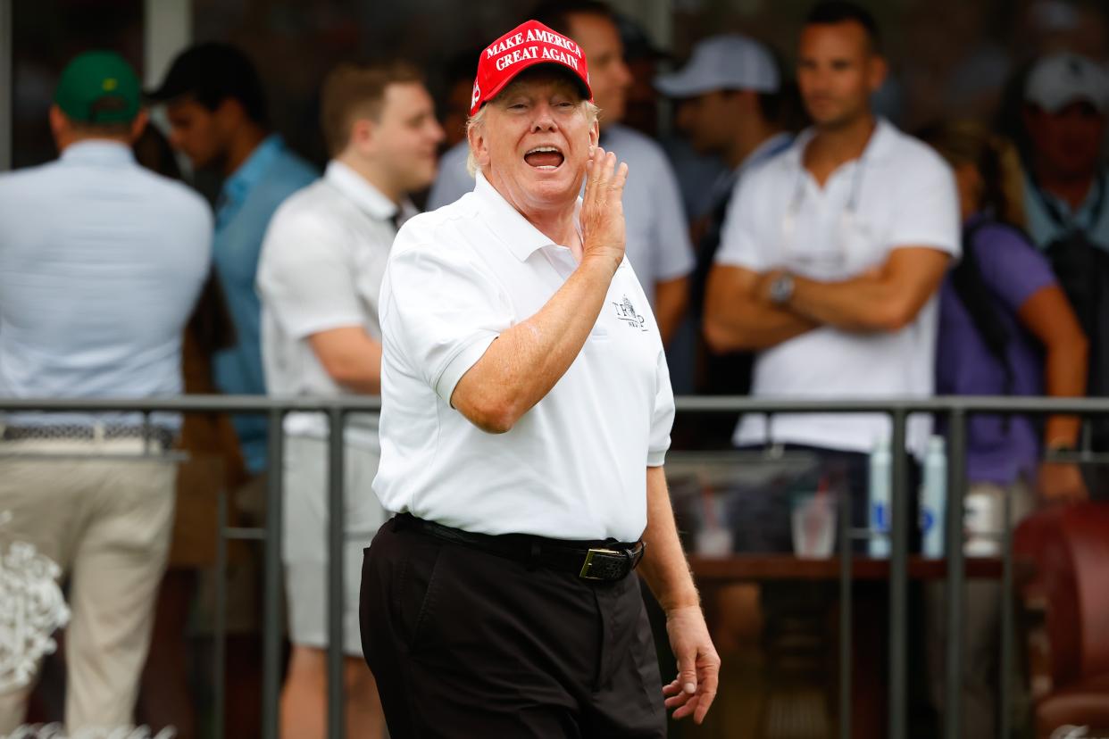 BEDMINSTER, NJ - JULY 31:  Former President Donald Trump walks on and talks to the fans at the 16th tee during the 3rd round of the LIV Golf Invitational Series Bedminster on July 31, 2022 at Trump National Golf Club in Bedminster, New Jersey.  (Photo by Rich Graessle/Icon Sportswire via Getty Images)