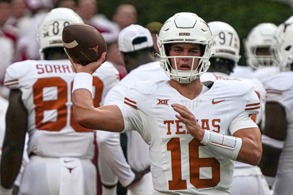 Texas quarterback Arch Manning warms up before the Longhorns' win over Alabama on Sept. 9. The five-start jewel of Texas' 2023 recruiting class, he has not yet played a down. But he enters this week as the No. 2 quarterback behind Maalik Murphy with Quinn Ewers injured.