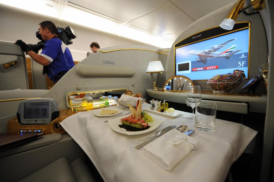 A meal setting in a first class seat aboard an Emirates Airlines A380 on August 1, 2008.