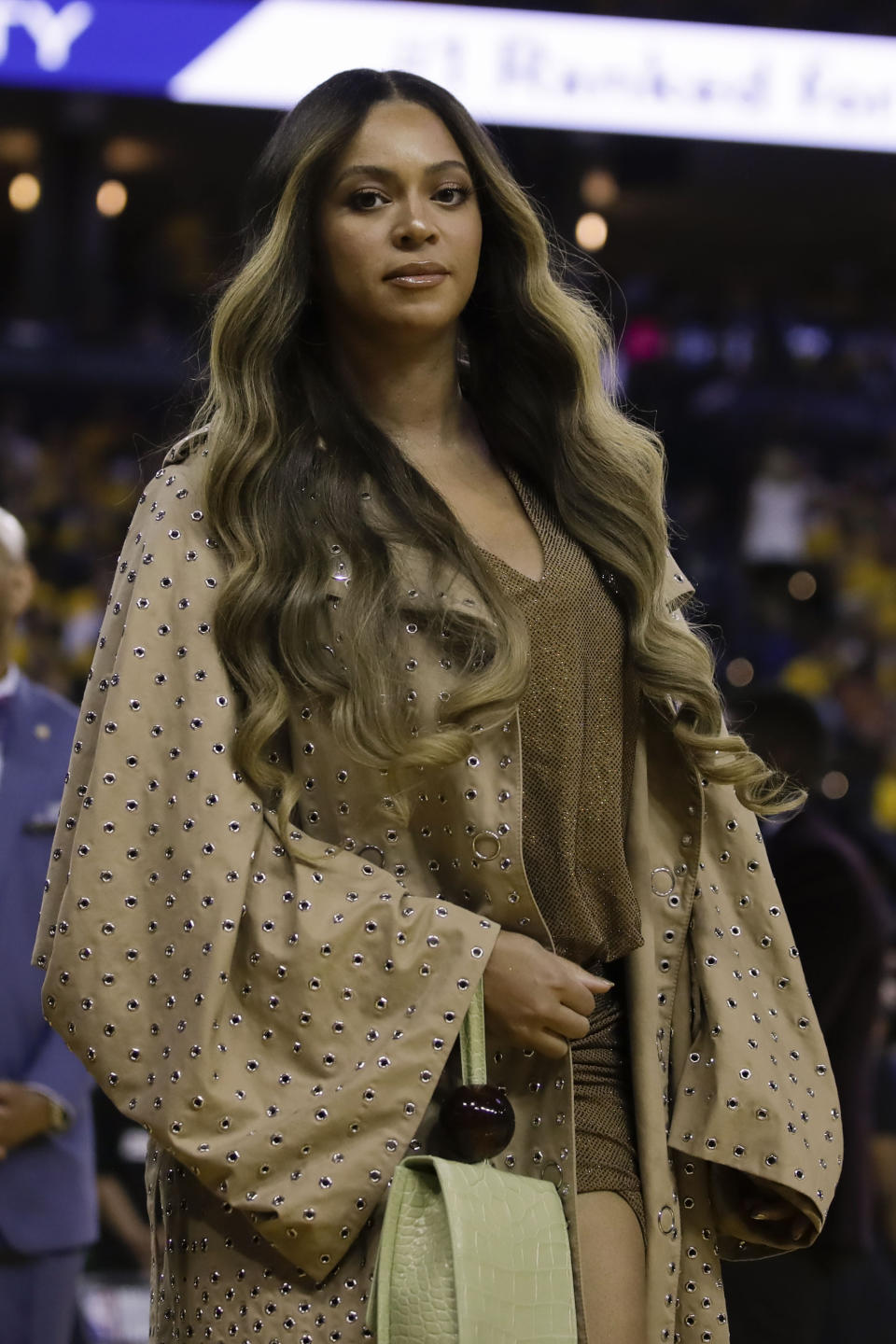 Beyonce walks to her seat during the first half of Game 3 of basketball's NBA Finals between the Golden State Warriors and the Toronto Raptors in Oakland, Calif., Wednesday, June 5, 2019. (AP Photo/Ben Margot)