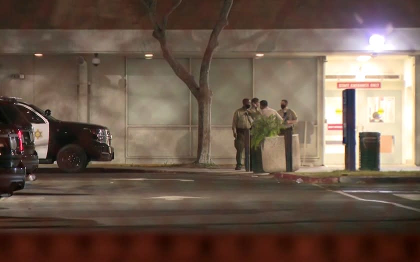 L.A. County Sheriff's deputies gathered outside Harbor-UCLA Medical Center.