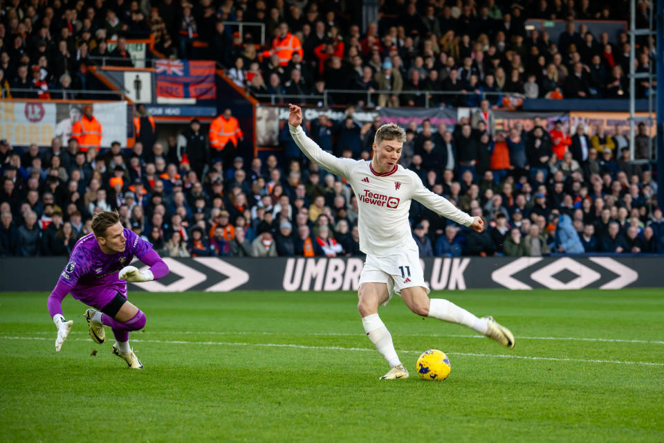 Manchester United's Rasmus Hojlund (right) scores against Luton. Town in their English Premier League match at Kenilworth Road.