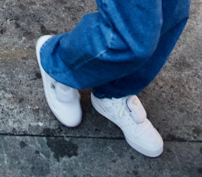 A closer look at A$AP Rocky wearing an unreleased pair of Prada x Adidas Forum Low sneakers. - Credit: Splash