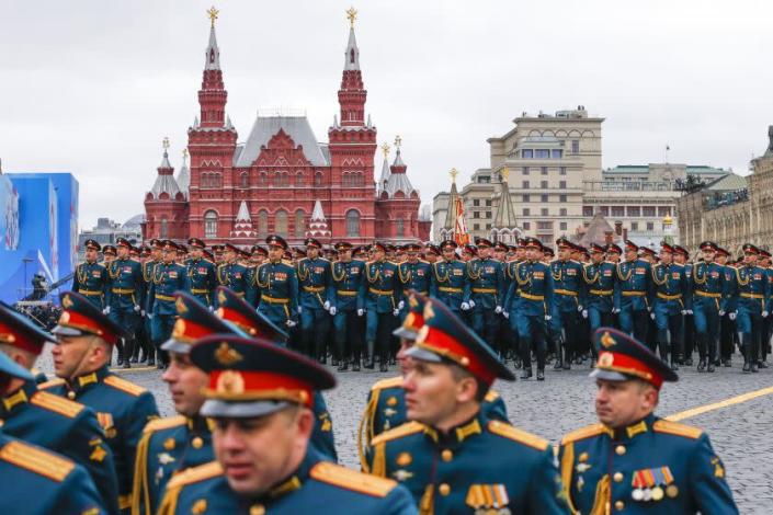 Russian soldiers march during the Victory Day military parade in Red Square in Moscow, Russia, Sunday, May 9, 2021.