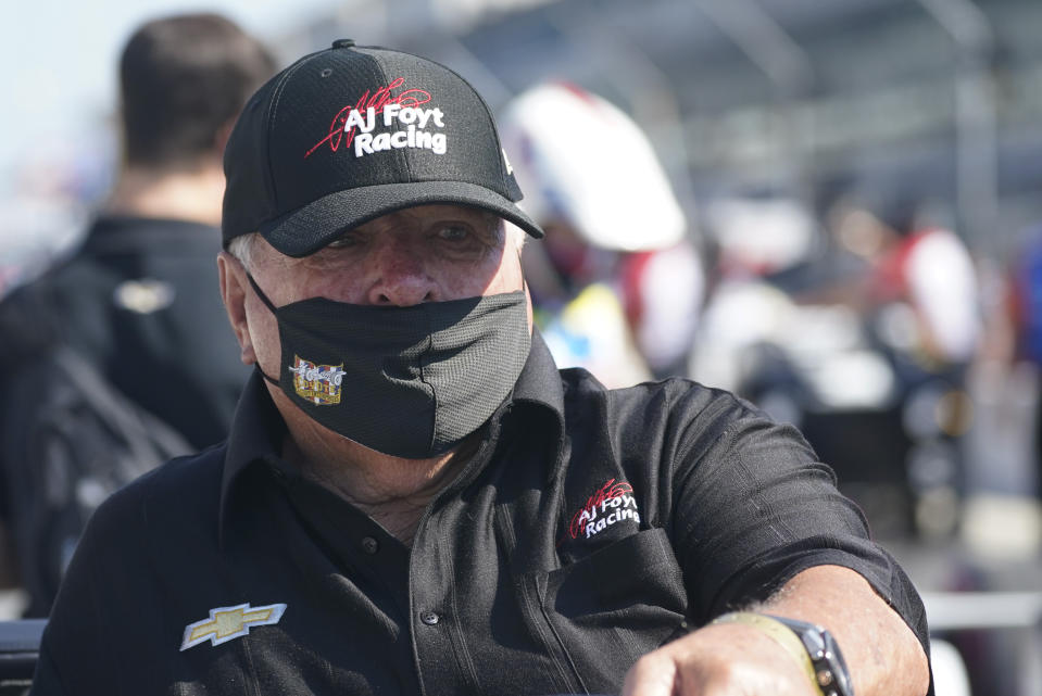 A.J. Foyt watches during qualifications for the Indianapolis 500 auto race at Indianapolis Motor Speedway, Saturday, Aug. 15, 2020, in Indianapolis. Even the seemingly indestructible 85-year-old, four-time Indianapolis 500 winner finds himself reluctantly wearing a mask and social distancing. (AP Photo/Darron Cummings)