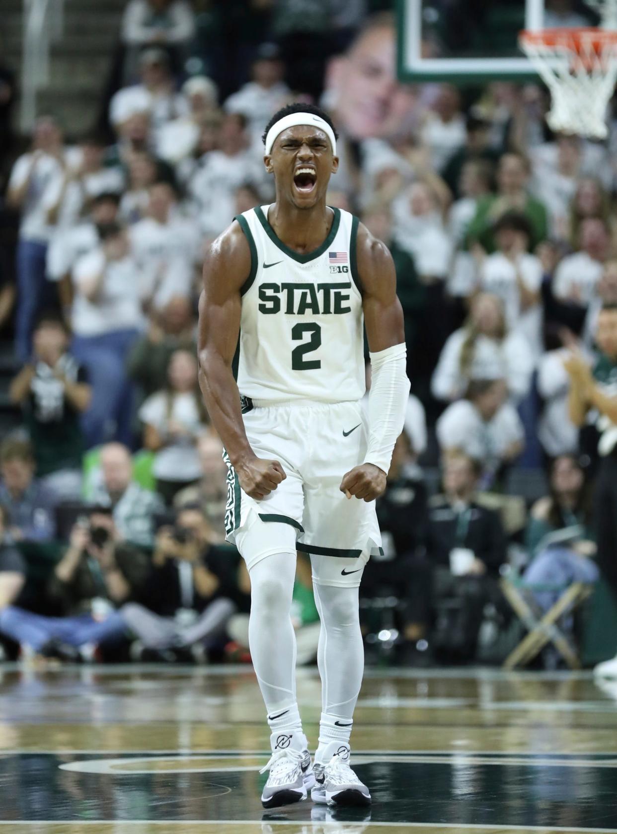 Michigan State Spartans guard Tyson Walker (2) reacts after making a three pointer against the Tennessee Volunteers during second-half action at Breslin Center in East Lansing on Sunday, Oct. 29, 2023.