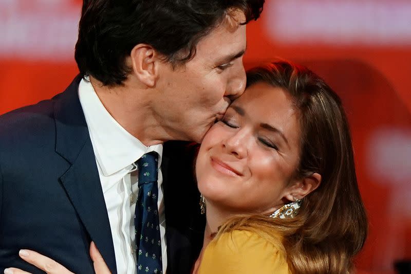 FILE PHOTO: Liberal leader and Canadian Prime Minister Justin Trudeau and his wife Sophie Gregoire Trudeau hug on stage after the federal election at the Palais des Congres in Montreal