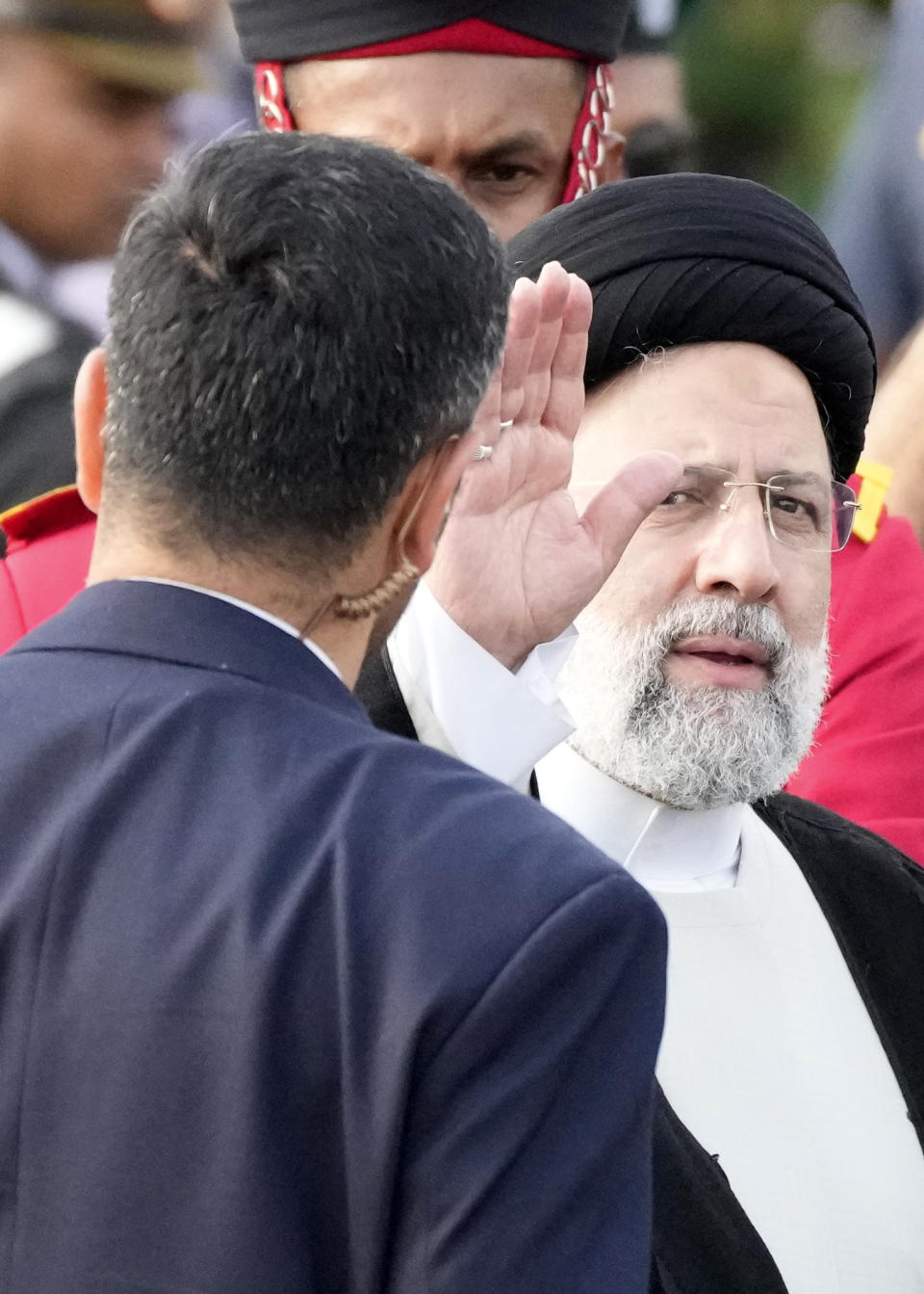 Iranian President Ebrahim Raisi, waves to the media after disembarking from a plane in Colombo, Sri Lanka, Wednesday, April 24, 2024. Raisi is the first Iranian leader to visit Sri Lanka since former President Mahmoud Ahmedinejad visited the country in 2008. (AP Photo/Eranga Jayawardena)