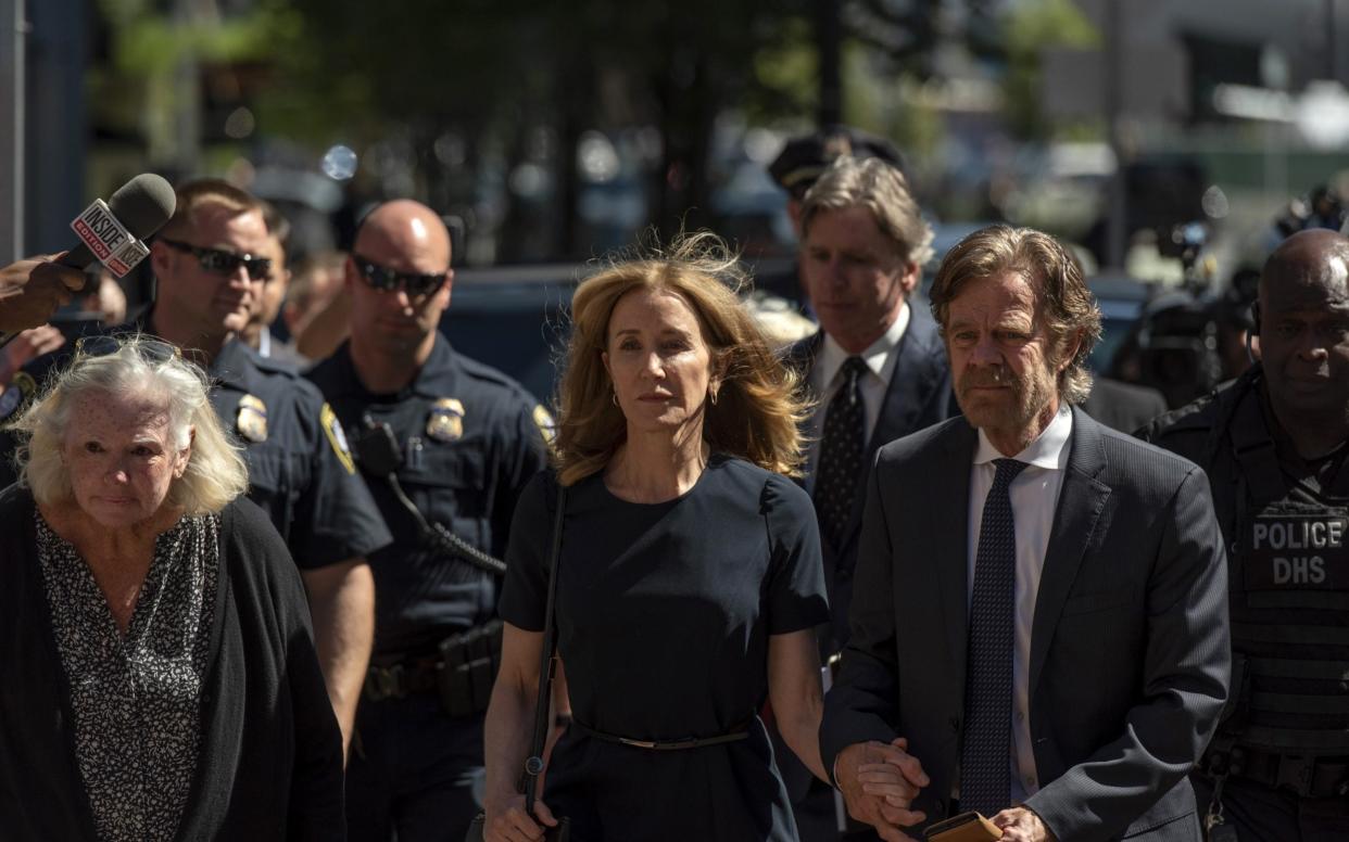 Felicity Huffman arrives in court for sentencing today - Bloomberg