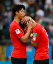 Soccer Football - World Cup - Group F - South Korea vs Mexico - Rostov Arena, Rostov-on-Don, Russia - June 23, 2018 South Korea's Son Heung-min and Hwang Hee-chan look dejected after the match REUTERS/Jason Cairnduff