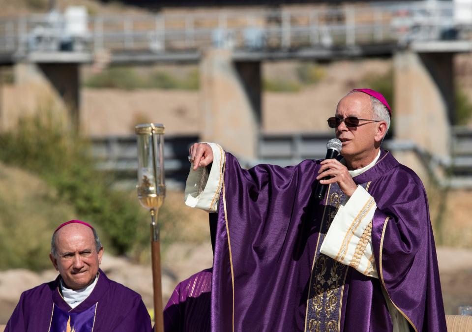 Bishop Mark J. Seitz speaks about the deaths of migrants at the border during a mass given by the catholic clergy of Las Cruces, New Mexico, El Paso, Texas, and Ciudad Juárez, Chihuahua in the middle of the river on Nov. 4, 2023.