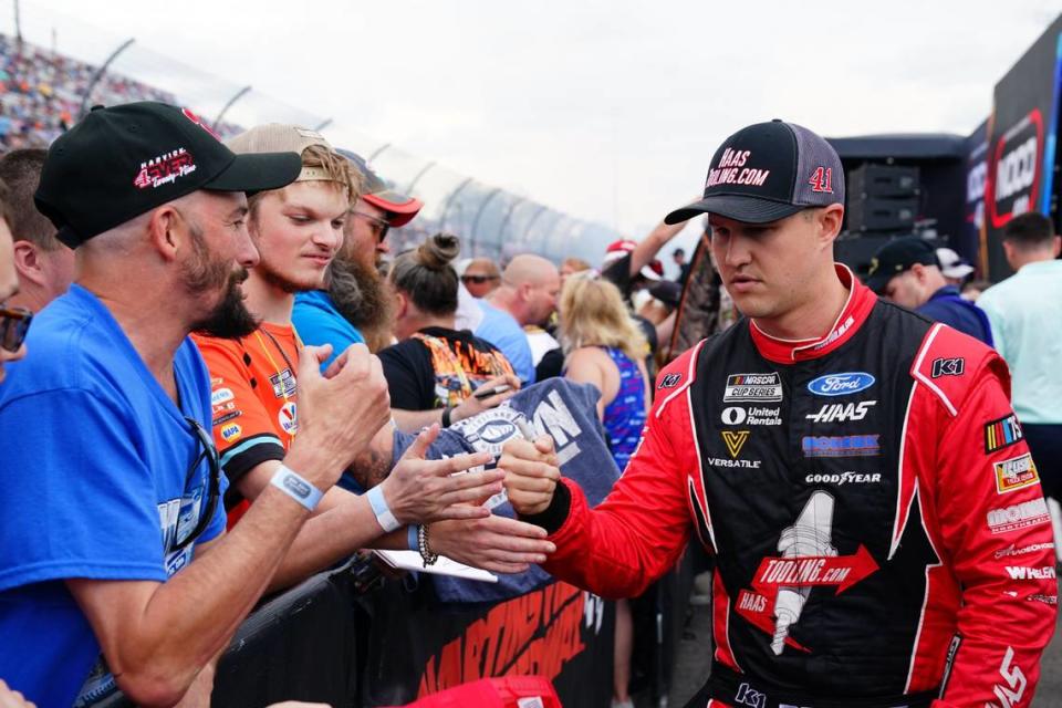 Apr 16, 2023; Martinsville, Virginia, USA; NASCAR Cup Series driver Ryan Preece (41) greets fans during prerace festivities before the NOCO 400 at Martinsville Speedway. Mandatory Credit: John David Mercer-USA TODAY Sports