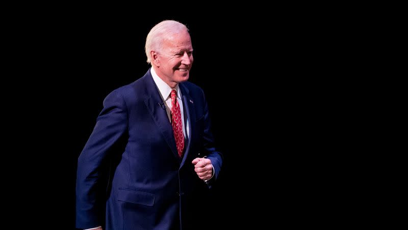 Joe Biden takes the stage at Kingsbury Hall on the campus of the University of Utah in Salt Lake City on Thursday, Dec. 13, 2018. President Biden will be returning to Utah between August 7 and 10, 2023.