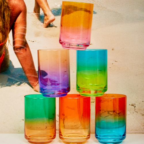 stack of multicolored glassware from coming soon ny