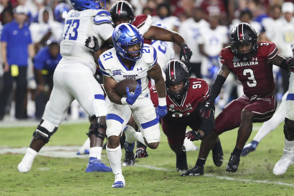 Georgia State running back Jamyest Williams (21) tries to get to the outside during the team's NCAA college football game against South Carolina on Saturday, Sept. 3, 2022, in Columbia, S.C. (AP Photo/Artie Walker Jr.)