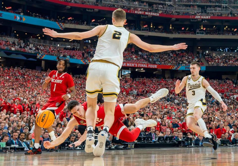 N.C. State’s Michael O’Connell (12) injures himself, pulling a hamstring, in the first half against Purdue in the NCAA Final Four National Semifinal game on Saturday, April 6, 2024 at State Farm Stadium in Glendale, AZ.