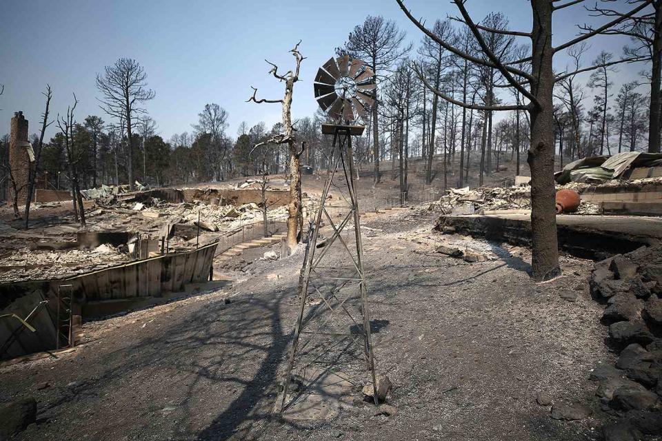 <p>Omar Ornelas/Anadolu via Getty Images</p> Structures that were destroyed in the Village of Ruidoso, New Mexico are photographed on June 19, 2024