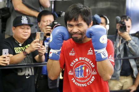 Boxer Manny Pacquiao arrives for a workout before his bout with Tim Bradley, in Hollywood, Los Angeles, California, United States, March 30, 2016. REUTERS/Lucy Nicholson