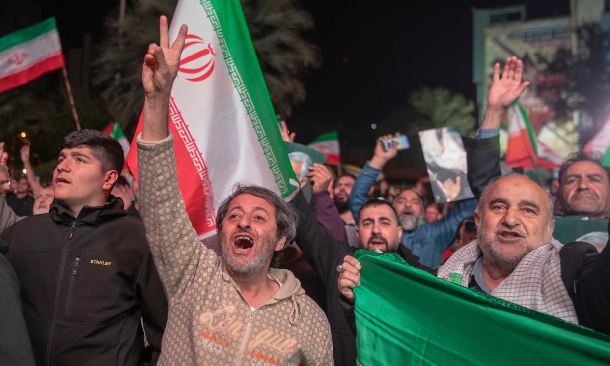 <span>People in Tehran hailed the success of Iran’s attack on Israel, despite causing relatively little damage. </span><span>Photograph: Majid Saeedi/Getty Images</span>