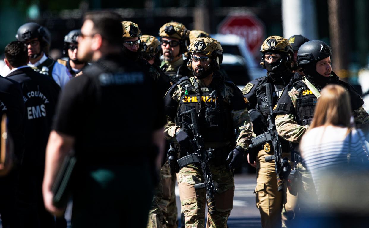 A huge presence of law enforcement swarmed a hostage situation at the Bank of America building at Bell Tower Shops. A suspect was killed by a sniper on the SWAT Team on Tuesday, Feb. 6, 2024. There were no injuries to the hostages or law enforcement.