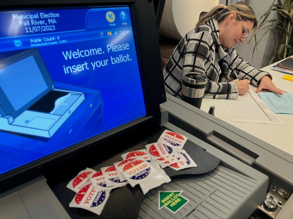 Ana Oliveira, 9B warden, is ready for voters early Tuesday morning, Nov. 7, 2023, at the polling location at Calvary Temple in Fall River.