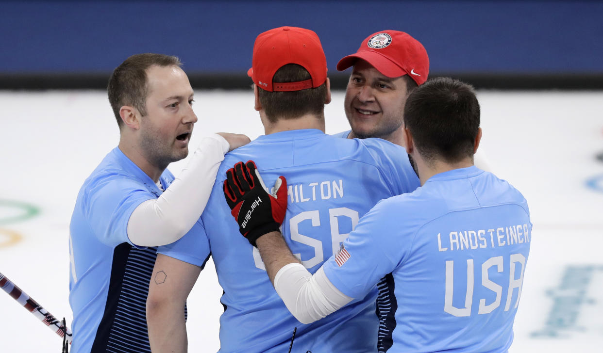 United States team jubilates after defeating Canada during the men’s curling semi-final match at the 2018 Winter Olympics in Gangneung, South Korea, Thursday, Feb. 22, 2018. United States won. (AP Photo/Aaron Favila)