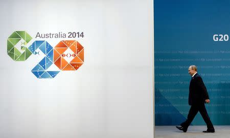 Russia's President Vladimir Putin arrives for the G20 summit in Brisbane November 15, 2014. REUTERS/Alain Jocard/Pool