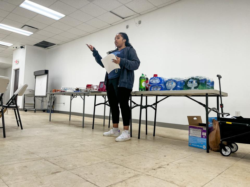 Shi'Anne Caldwell, a voting-access advocate for the group Common Cause, explains new voting rules to attendees during a session at a Muslim community center near Charlotte.