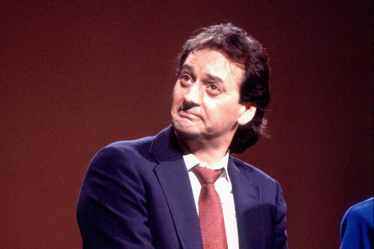 <span>Joe Flaherty performs during the Second City 25th anniversary show in Chicago on 16 December 1984.</span><span>Photograph: Paul Natkin/WireImage</span>