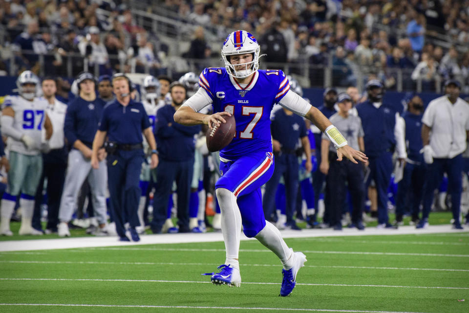 Nov 28, 2019; Arlington, TX, USA; Buffalo Bills quarterback Josh Allen (17) runs for a touchdown against the Dallas Cowboys during the game at AT&T Stadium. Mandatory Credit: Jerome Miron-USA TODAY Sports