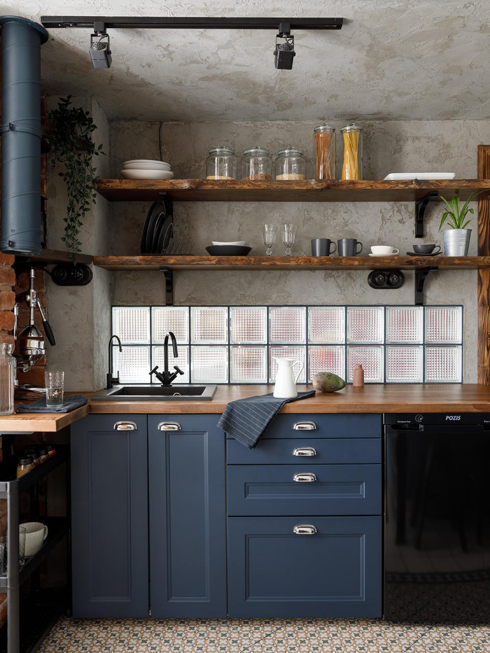 Kitchen with glass brick splashback