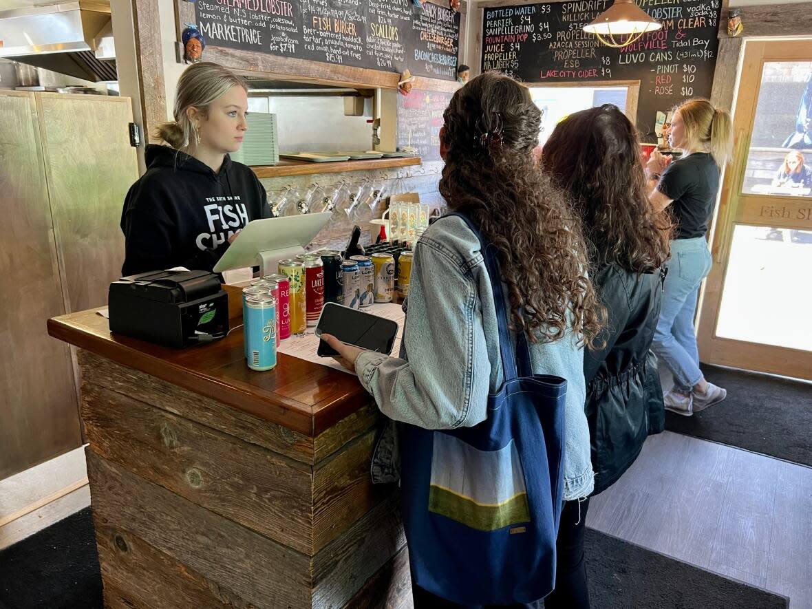 Nova Scotia small businesses may see different impacts from the federal government's May 2023 announcement that it has negotiated lower credit card interchange fees for small businesses. (Paul Palmeter/CBC - image credit)