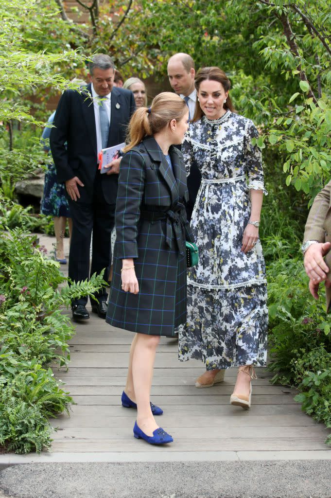 3) Will and Kate tour an exhibit.