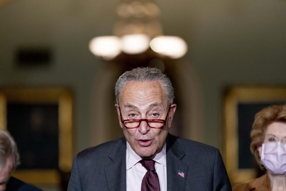 Senate Majority Leader Chuck Schumer of N.Y., speaks to reporters following a Democratic strategy meeting at the Capitol in Washington, Tuesday, Oct. 19, 2021. (AP Photo/Andrew Harnik)