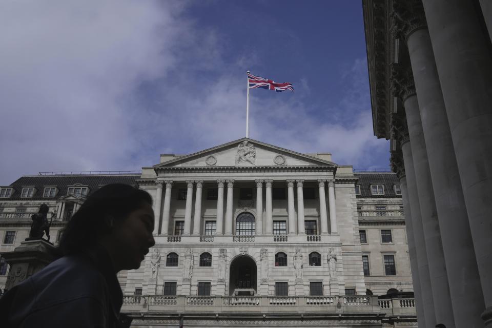 Bank of England A woman walks in front of the Bank of England, at the financial district in London, Thursday, March 23, 2023. (AP Photo/Kin Cheung)