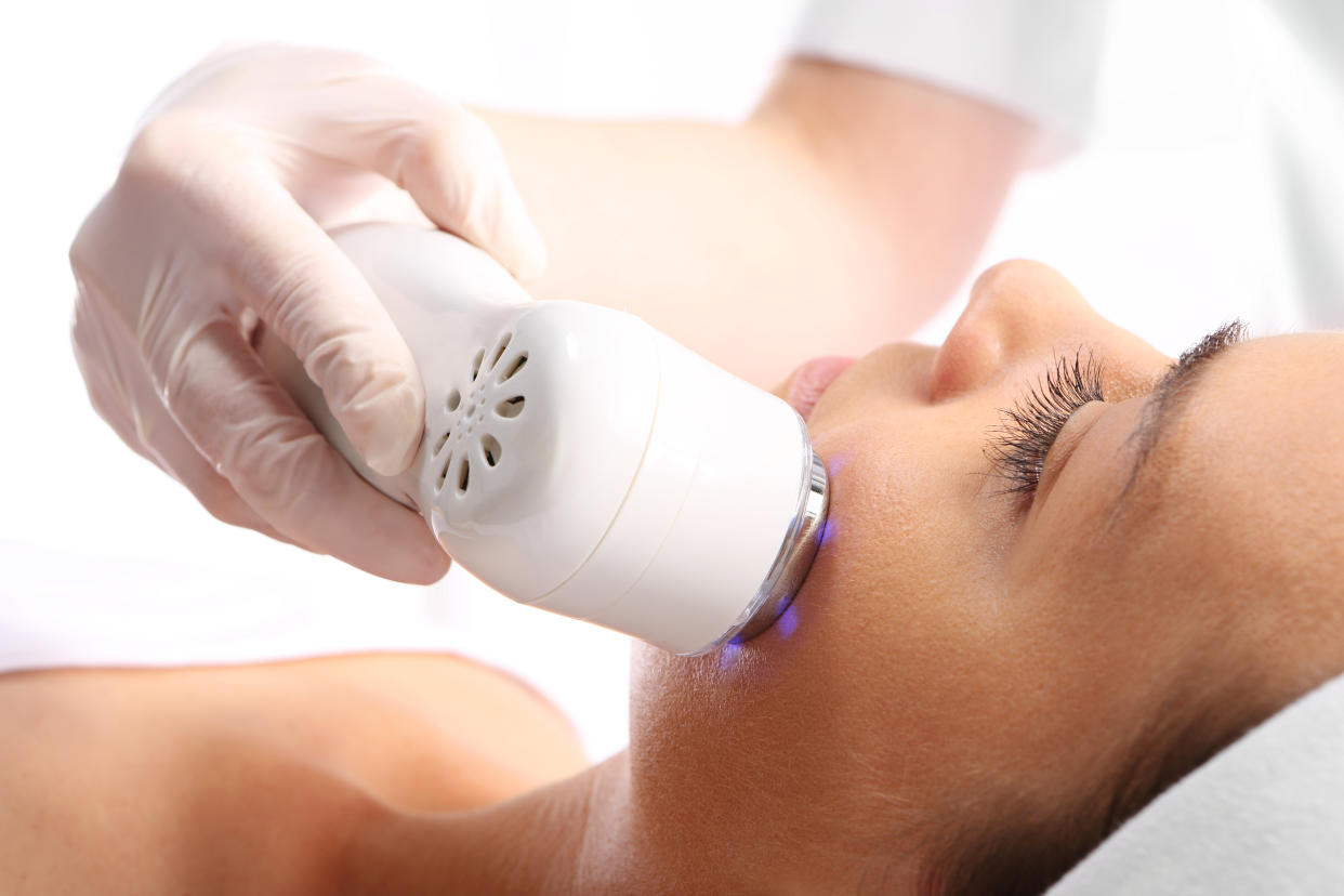 The woman's face during a facial at a beauty salon