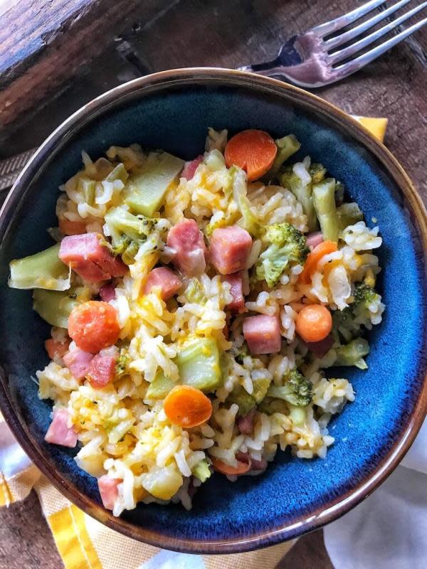<p>This cheesy ham and broccoli rice casserole is an easy-peasy weeknight dinner that's filled with extra veggies and ham!</p><p><strong>Get the recipe: <a href="https://theskinnyishdish.com/cheesy-ham-and-broccoli-rice-casserole/" rel="nofollow noopener" target="_blank" data-ylk="slk:Cheesy Ham and Broccoli Rice Casserole;elm:context_link;itc:0;sec:content-canvas" class="link rapid-noclick-resp">Cheesy Ham and Broccoli Rice Casserole</a></strong></p>