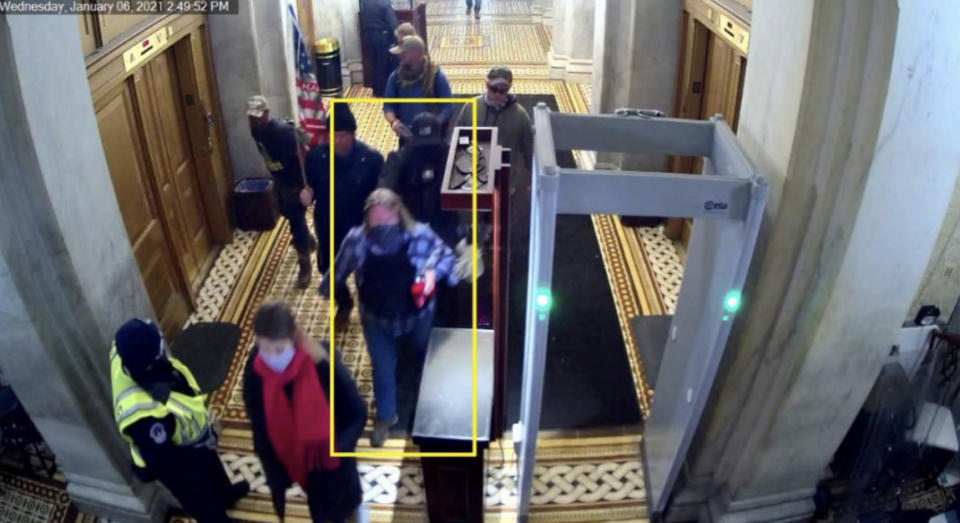 Image 11: Still from CCTV capturing Munchel and Eisenhart’s exit via the Senate Carriage doors (Exhibit 510.2)