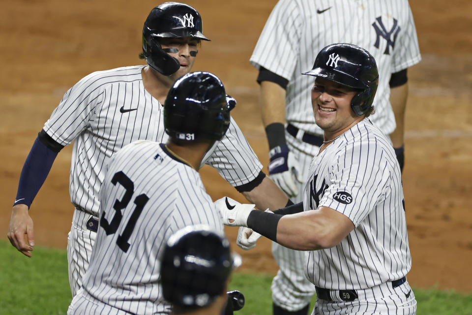 New York Yankees' Luke Voit celebrates hitting a three-run home run during the second inning of a baseball game against the Toronto Blue Jays on Tuesday, Sept. 15, 2020, in New York. (AP Photo/Adam Hunger)